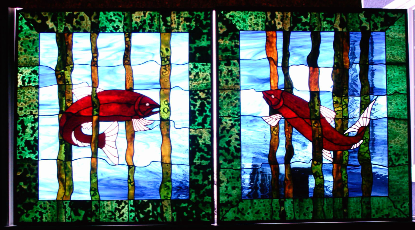 two windows with facing salmon