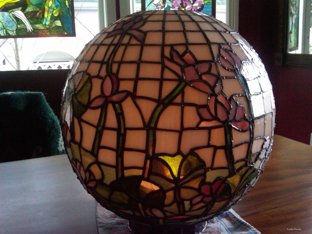 A Tiffany-style globe lamp with flowers